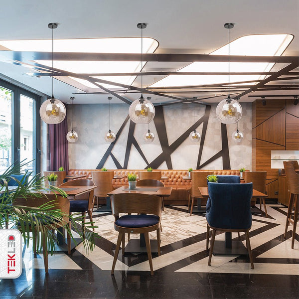 Smoky glass globe pendant light with e27 fitting in indoor setting kitchen